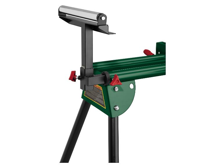 Ein grünes Werkstattwagen-Rollengestell mit einer silbernen Rolle.