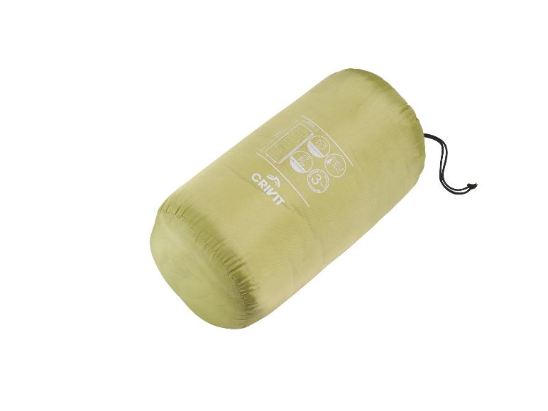 Olivfärbener Crivit Schlafsack, komprimiert.