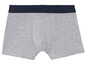 Graue Boxershorts mit dunkelblauem Bund.