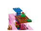 LEGO Minecraft-Set mit einem rosa Schwein und einem Garten.