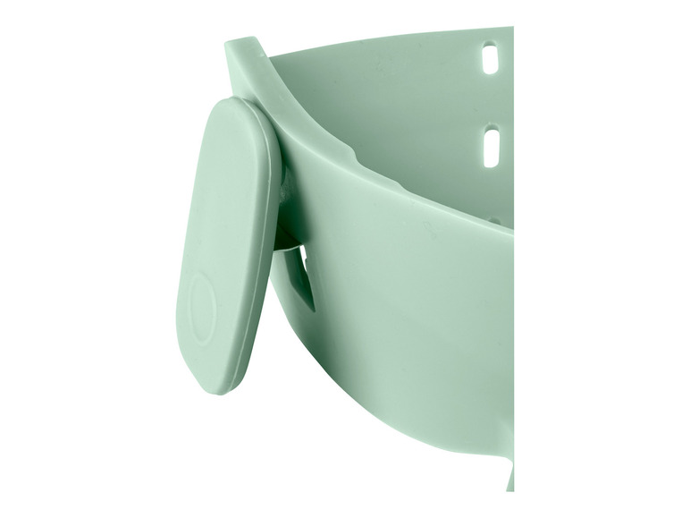 Ein hellgrünes Silikonarmband für eine Smartwatch.