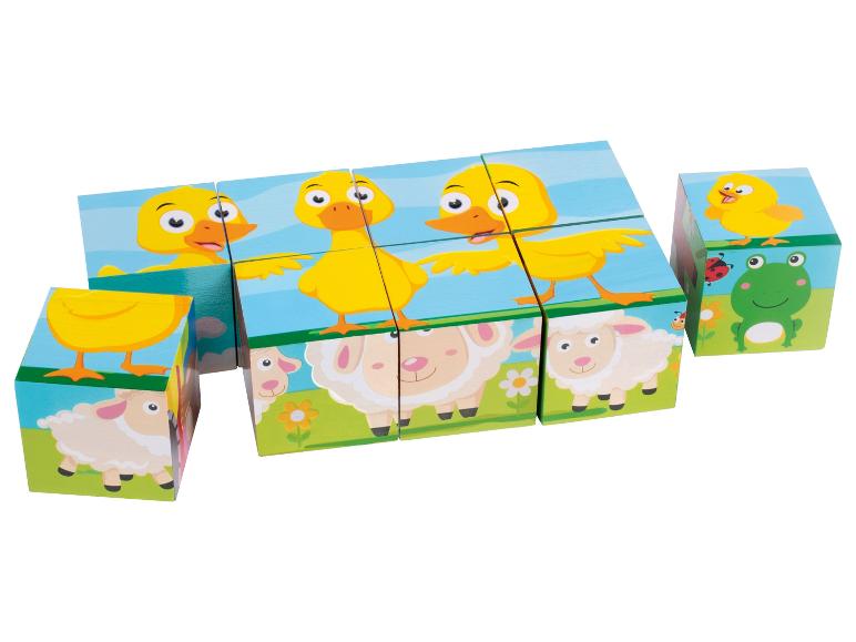 Holzb Bausteine mit Bildern von Enten und Schafen