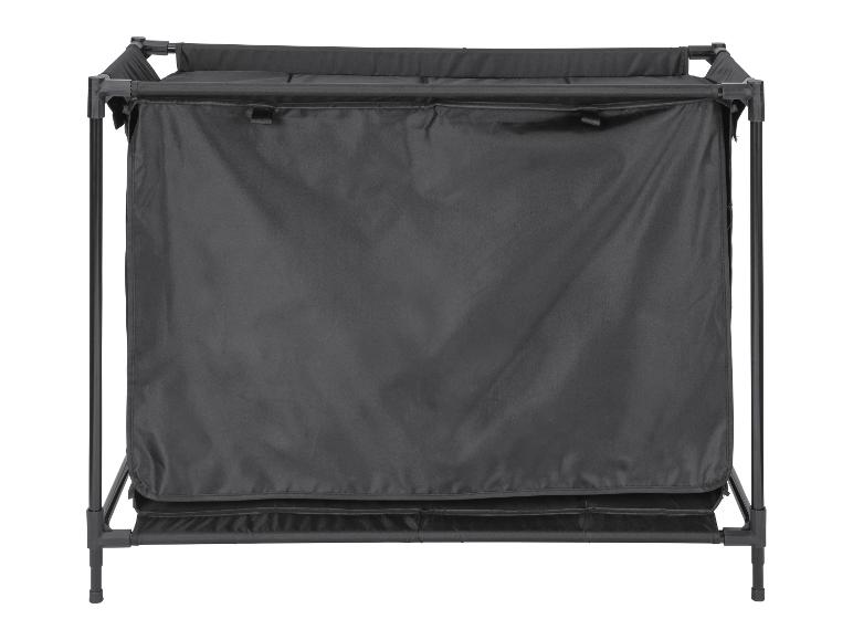 Faltbarer Wäschekorb mit schwarzem Stoff und Metallrahmen.