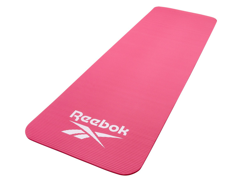 Eine rosa Fitnessmatte von Reebok.