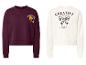Zwei Sweatshirts: ein bordeauxrotes mit „Croissant Club“ und ein weißes mit „Creative Vibes“.