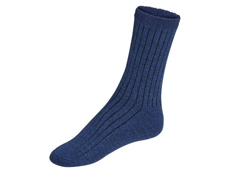 Eine blaue Socke mit vertikalen Streifen.