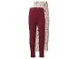 Zwei Baby-Leggings: eine einfarbige bordeauxrote und eine cremefarbene mit Blumenmuster.