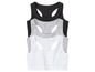 Drei Tanktops in Schwarz, Grau und Weiß.