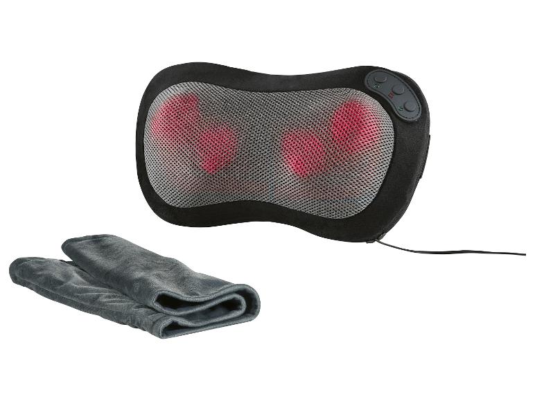 Schwarzes elektrisches Massagekissen mit Wärme und Bedienelementen, begleitet von einem grauen Handtuch.