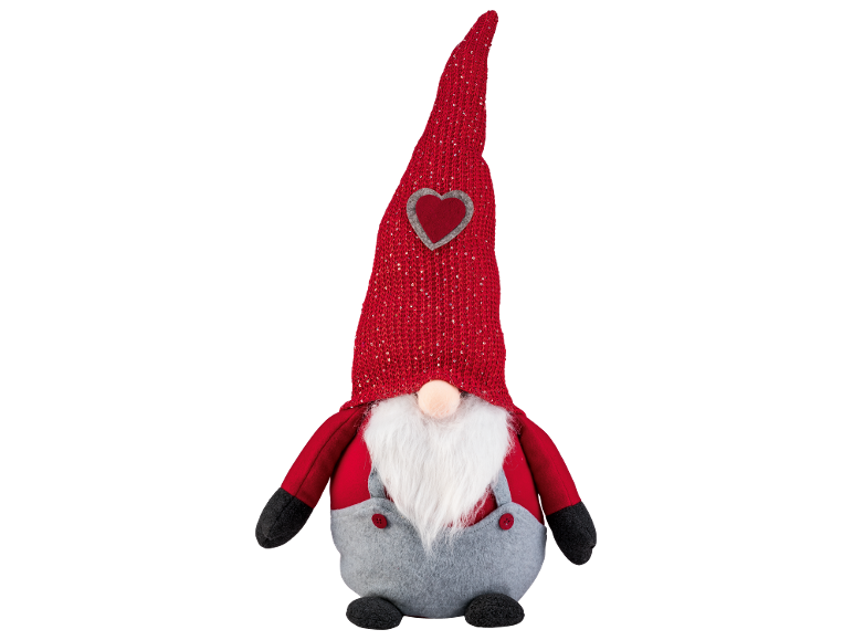 Dekorativer Weihnachtsgartenzwerg mit weißem Bart und roter Mütze mit Herz.