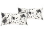 Zwei Kissen mit einem schwarz-weiß floralen Muster.