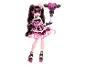 Monster High Draculaura Puppe in pink-schwarzem Kleid mit passenden Accessoires.