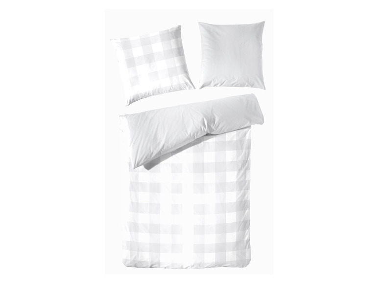 Ein weißer Bettbezug mit Karomuster.