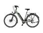 Hellgrünes E-Citybike mit integriertem Akku und Gepäckträger.