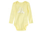 Gelber Baby-Strampler mit drei Enten darauf.
