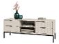 Weißer TV-Schrank mit geriffelten Schubladen, schwarzen Beinen und Dekorationen
