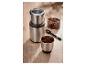 SilverCrest Kaffeemühle aus Edelstahl mit Kaffeebohnen und gemahlenem Kaffee.