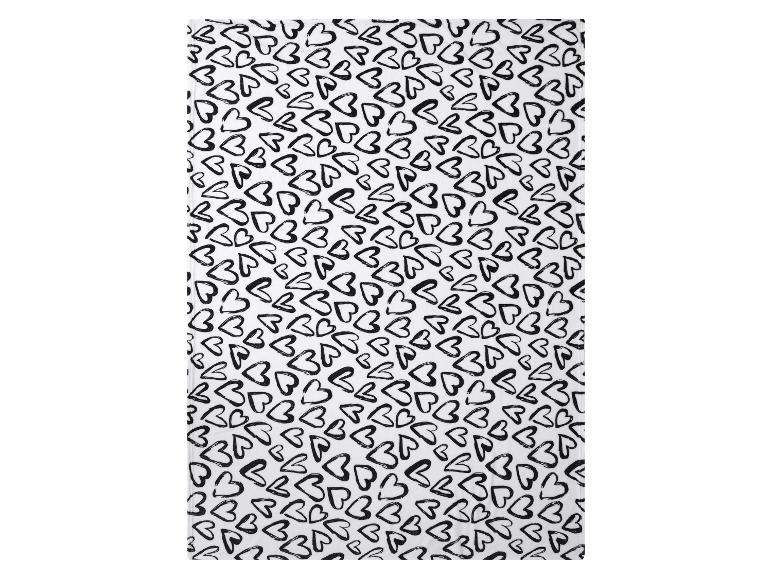 Weißes Küchentuch mit schwarzem Herzmuster