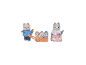 Husky-Figurenfamilie mit Vater, der einen Schlitten mit drei Babys zieht, und Mutter.