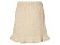 Beige Rock mit durchbrochenen Mustern, Boho-Stil.