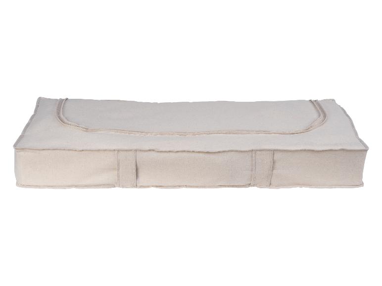 Beige Bodenkissen aus Stoff, minimalistischer Stil.