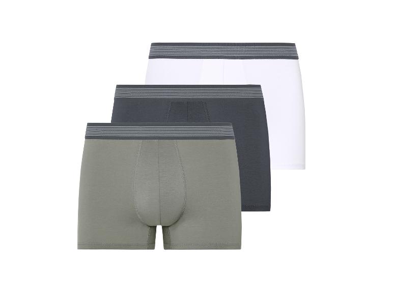 Drei Herren-Boxershorts: oliv, dunkelgrau, weiß.