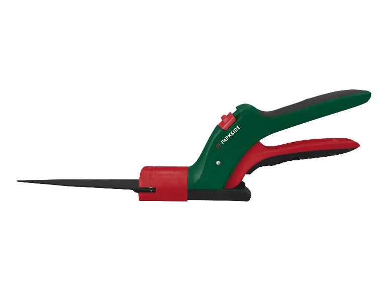 PARKSIDE Grasschere in Grün und Rot mit schwarzen Klingen.