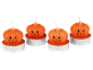 Vier Halloween-Kürbis-Teelichter mit lächelnden Gesichtern.