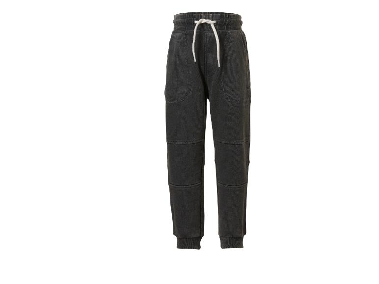 Dunkelgraue Jogginghose mit weißem Kordelzug und Nahtdetails.