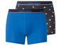 Zwei Paar Happy Shorts Boxershorts, eine in Blau und eine mit Herzen.