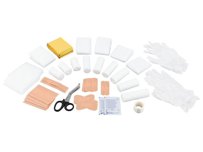 Erste-Hilfe-Set mit Verbänden, Pflastern, Handschuhen und einer Notfalldecke.