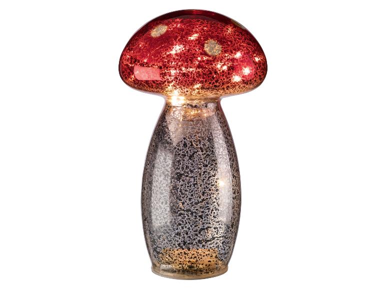 Rote Pilzlampe mit gesprenkeltem silbernem Sockel.