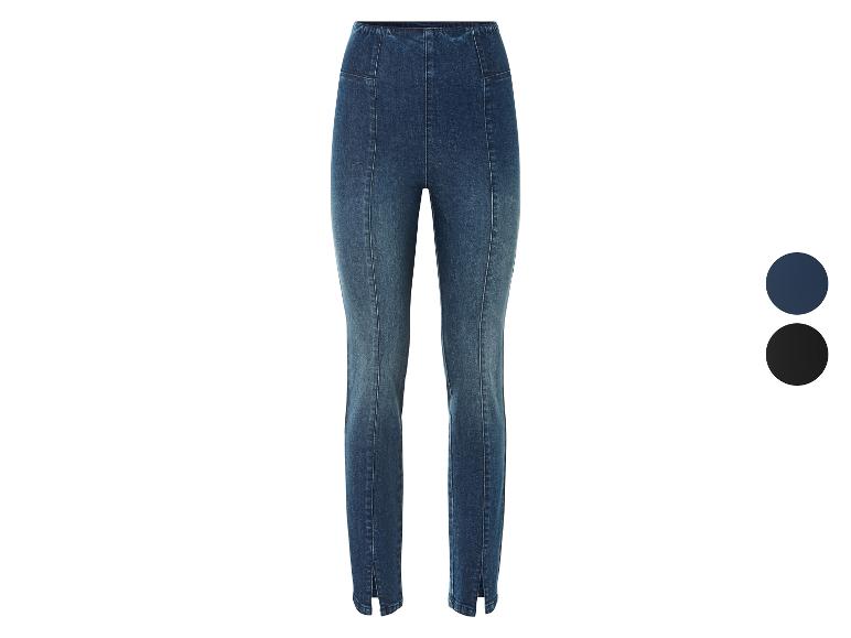 Dunkelblaue Skinny Jeans mit Schlitzen.