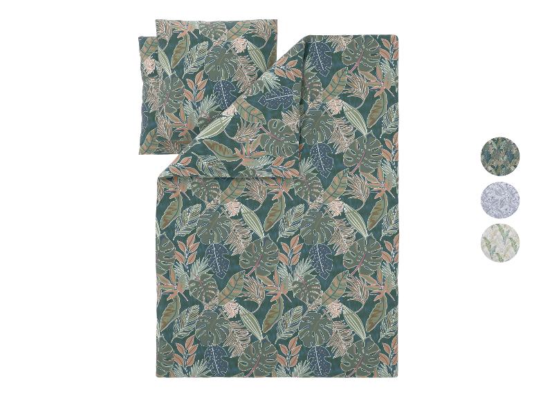 Bettwäsche-Set mit tropischem Blättermuster in Grün- und Brauntönen.