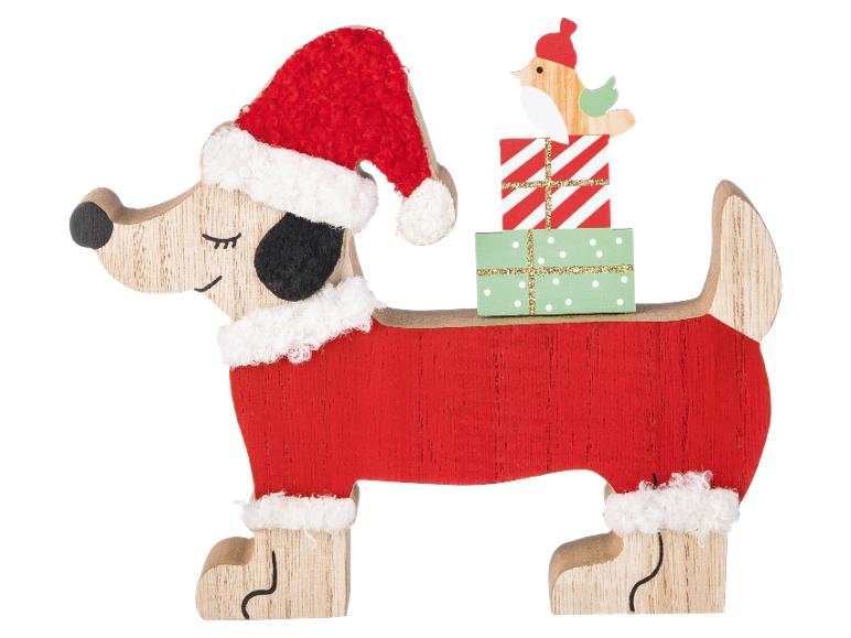 Weihnachtsdekoration aus Holz: Hund mit Weihnachtsmütze und Geschenken auf dem Rücken.