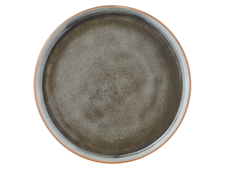 Ein grauer Teller mit rissigem Glazu.