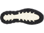Schuhsohle mit schwarzen und beigen Traktionsmustern.