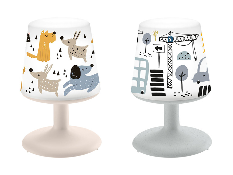 Zwei Kinderlampen mit Hund- und Stadtmotiv.