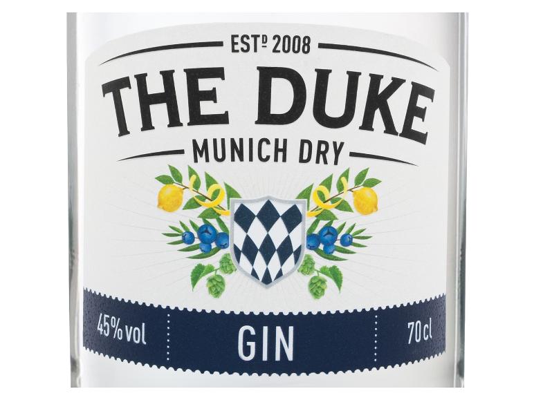 The Duke Munich Dry Gin Etikett mit Zitronen, Heidelbeeren und Hopfen.