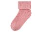 Ein rosa Socken mit geripptem Rand.