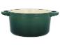 Grüner Le Creuset gusseiserner Topf.