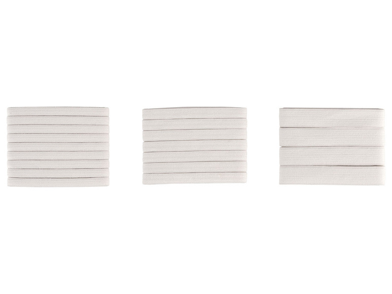 Drei Stapel weißer Gummibänder