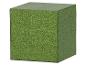 Grüner, rechteckiger Block mit grasähnlicher Textur.