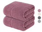 Zwei rosa Handtücher gestapelt