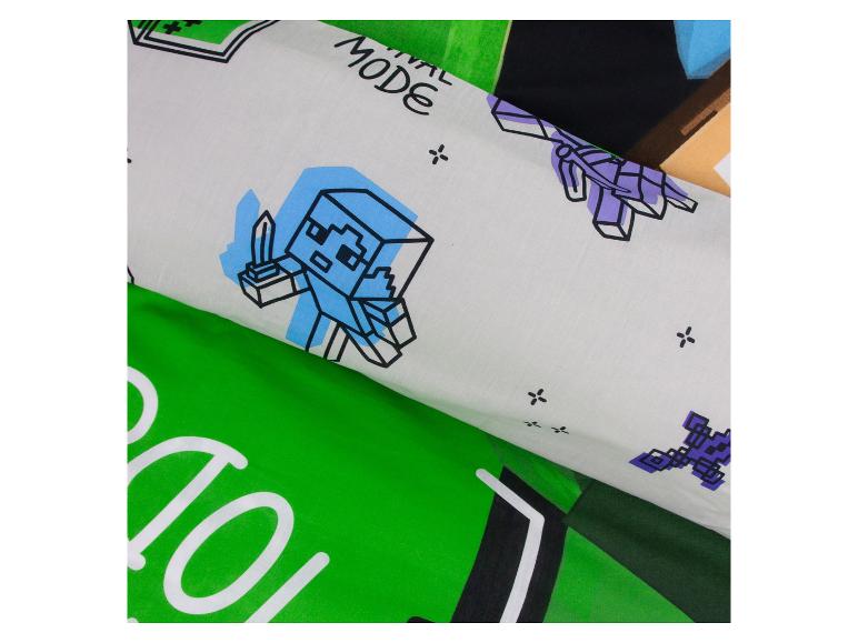 Bettwäsche mit Pixelcharakteren und dem Schriftzug „MODE“.