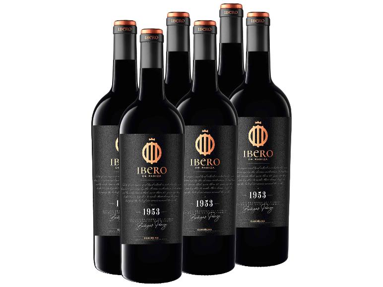 Sechs Flaschen Ibero de Paniza Rotwein mit schwarzen und goldenen Etiketten.