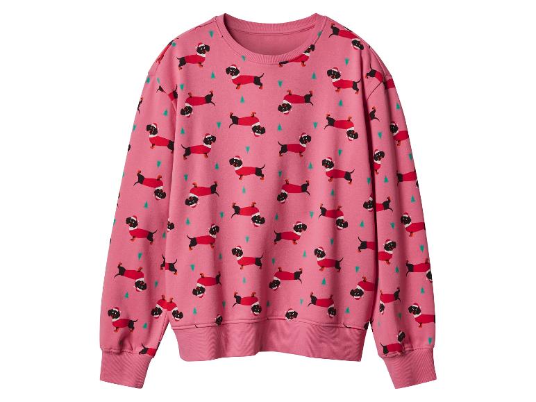 Ein pinkfarbenes Sweatshirt mit Weihnachtsdackel- und Tannenbaum-Print.