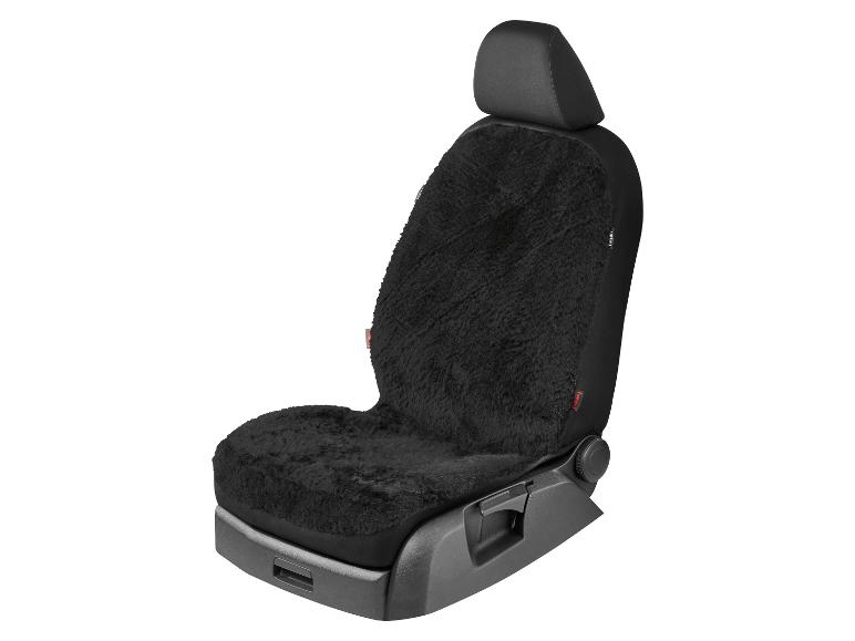Schwarzer Lammfell-Autositzbezug.