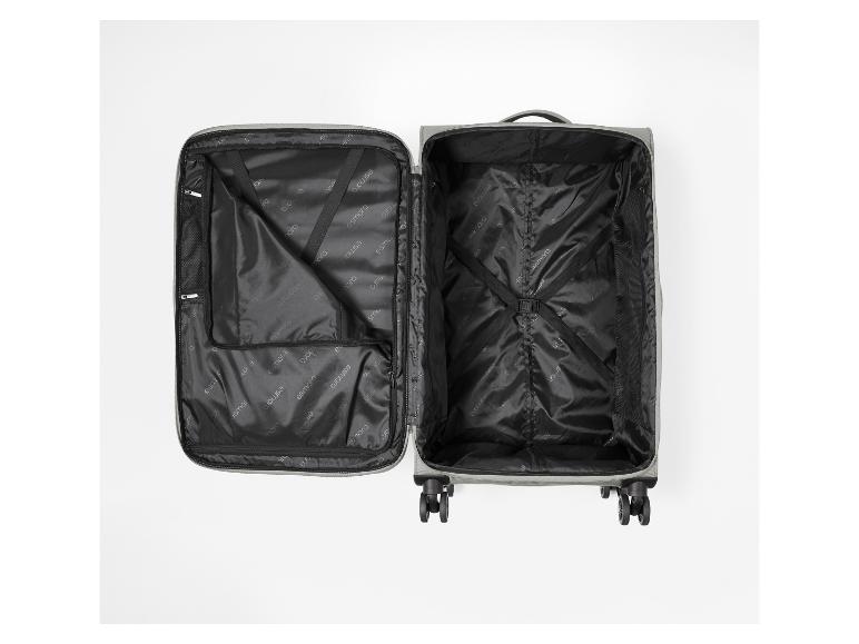 Offener Reisekoffer mit schwarzem Innenraum und Befestigungsgurten.