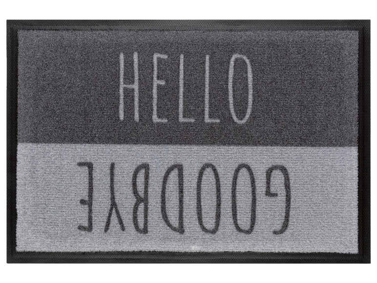 Eine graue Fußmatte mit den Worten 'HELLO' und 'GOODBYE'